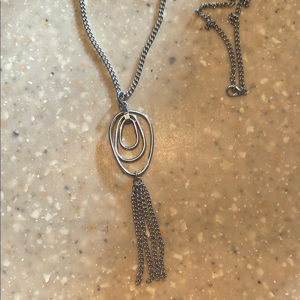 Elegant Silver Necklace with Tassel